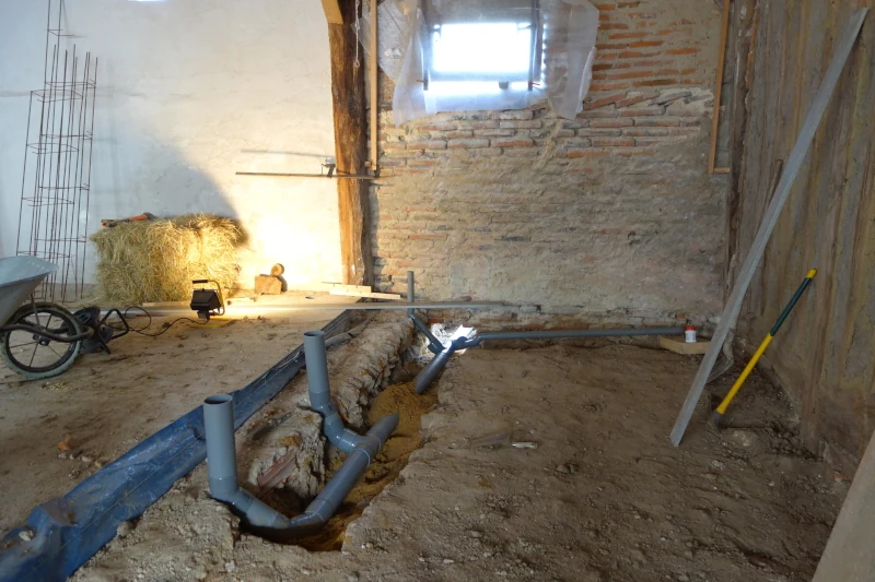 Mise en place des évacuations sur le chantier.